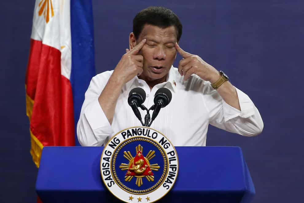 Philippine president Rodrigo Duterte has denied condoning extrajudicial killings of drug suspects (Bullit Marquez/AP)
