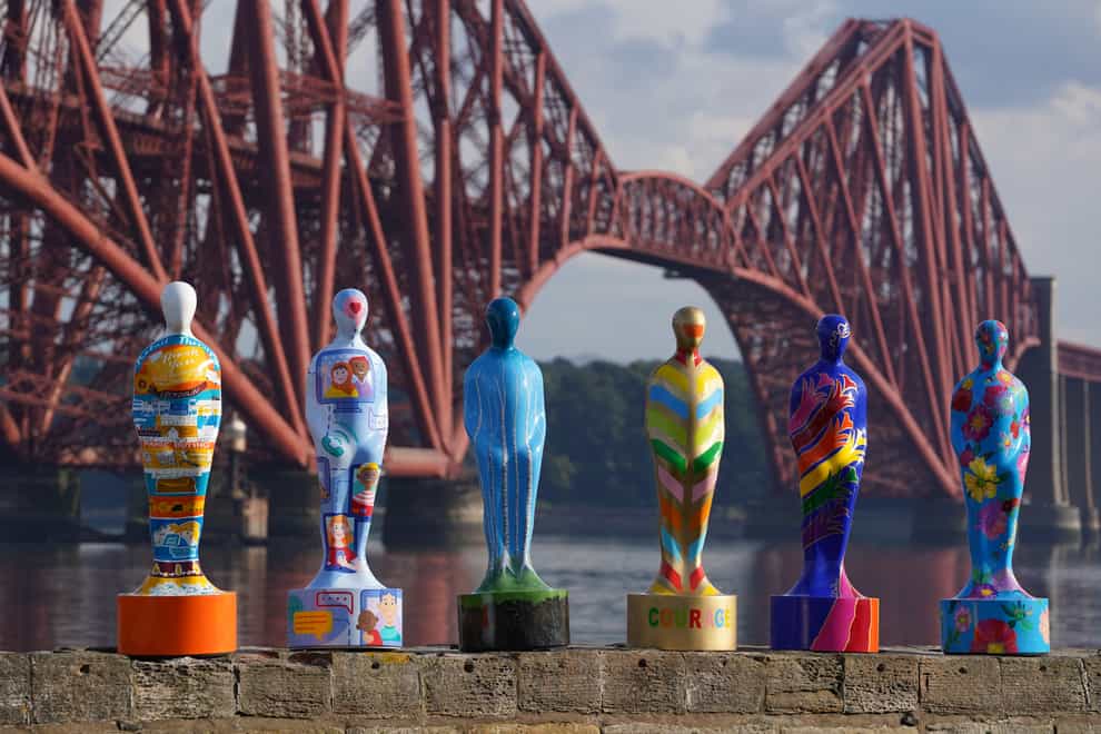 Some of the sculptures from the art installation Gratitude at The Forth Bridge at North Queensferry (Andrew Milligan/PA)