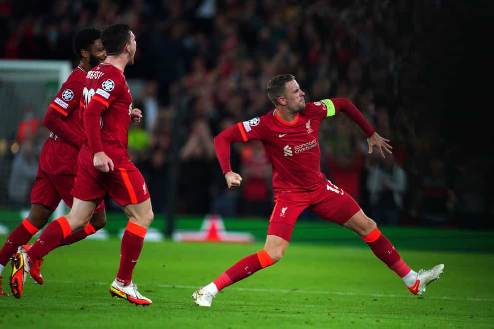 Jordan Henderson (right) celebrates scoring Liverpool’s winner (Peter Byrne/PA)