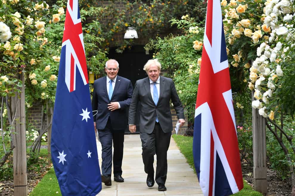 Prime Minister Boris Johnson (right) and Australian Prime Minister Scott Morrison announced the creation of the Aukus pact alongside US President Joe Biden (Dominic Lipinski/PA)