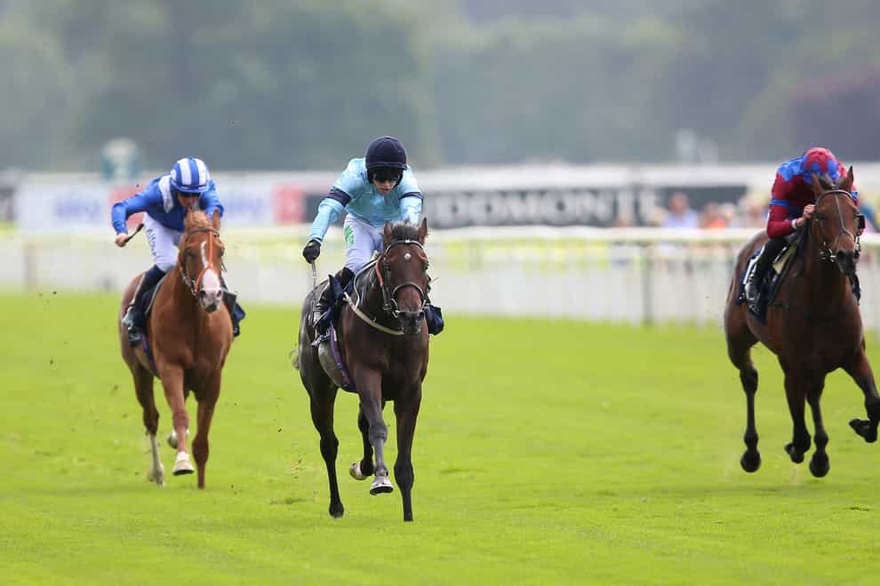 Dubawi Legend (right) running in the Acomb Stakes (Nigel French/PA)
