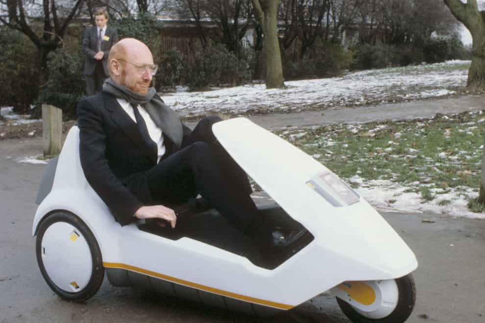 Sir Clive Sinclair demonstrating his C5 electric vehicle (PA)
