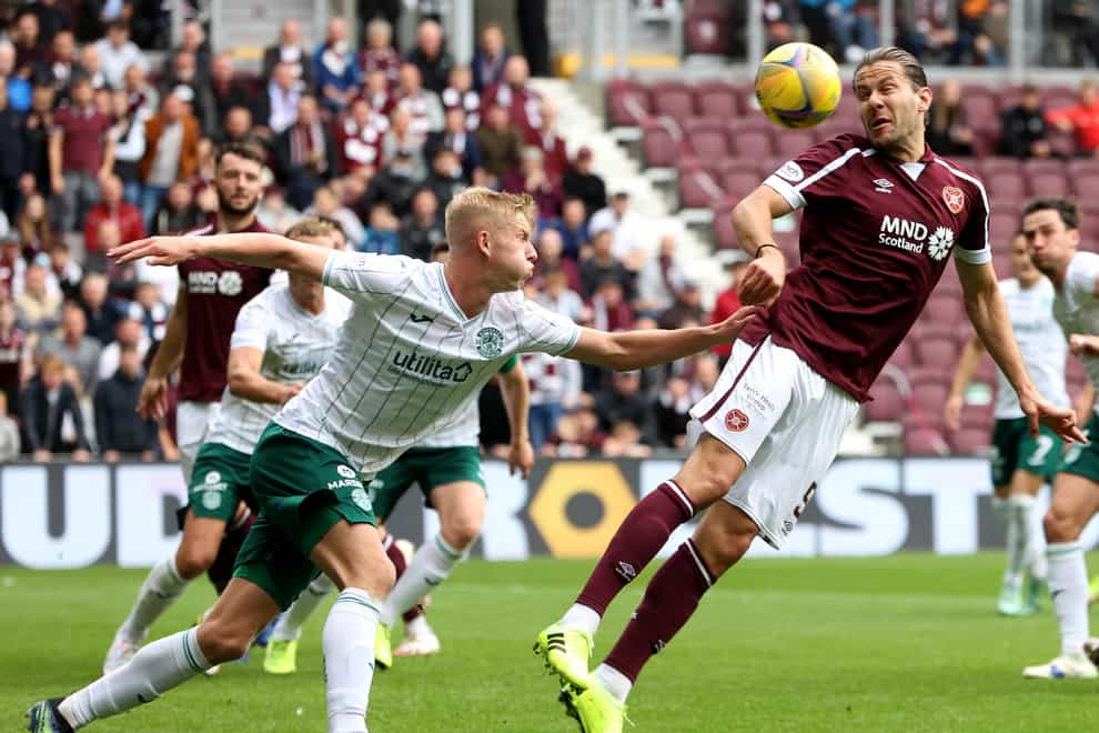Peter Haring, right, in action against Hibernian (Jeff Holmes/PA)