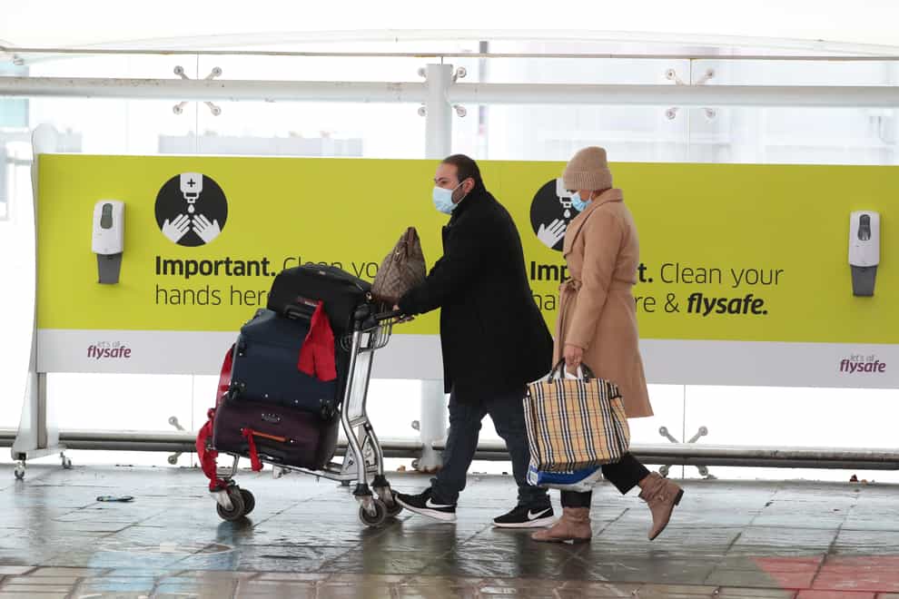 Passengers at Edinburgh airport (Andrew Milligan/PA)