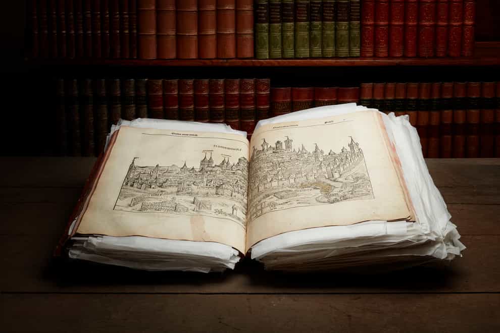 The book, a copy of the Nuremberg Chronicle, is to go under the hammer at auctioneers Lyon & Turnbull (PA)