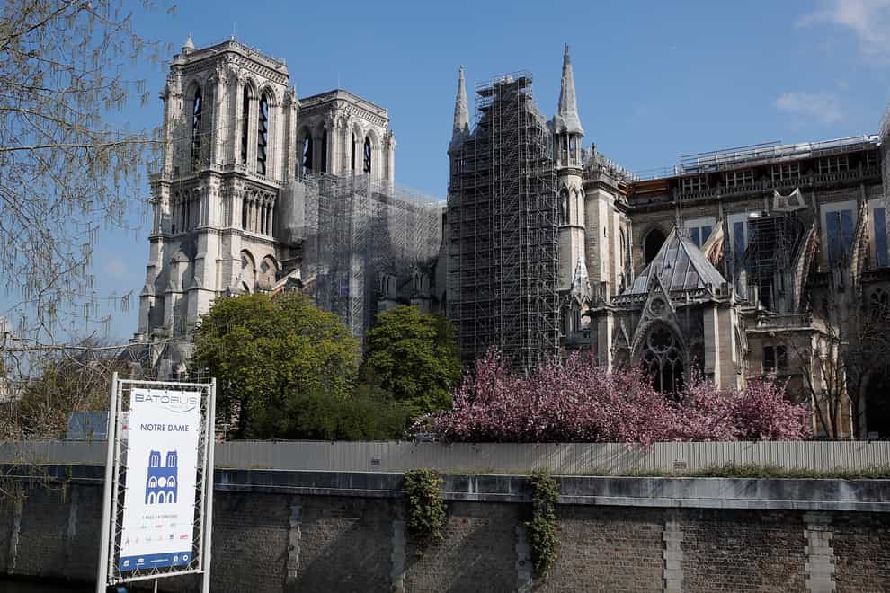 Notre Dame cathedral has been shroud in scaffolding (Francois Mori/AP)