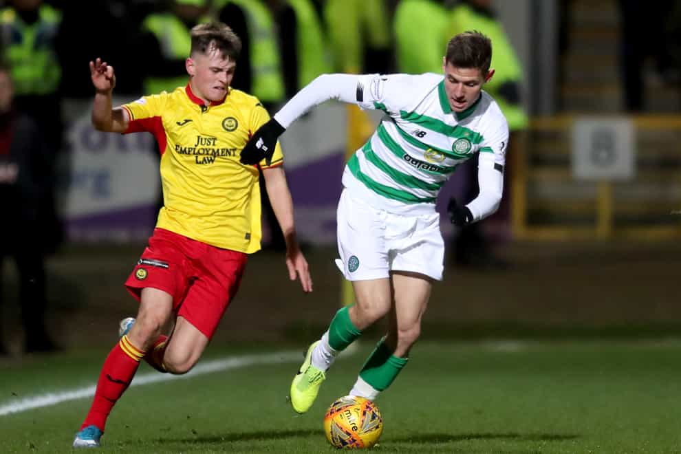 James Penrice, left, in action against Celtic for Partick Thistle (Jane Barlow/PA)