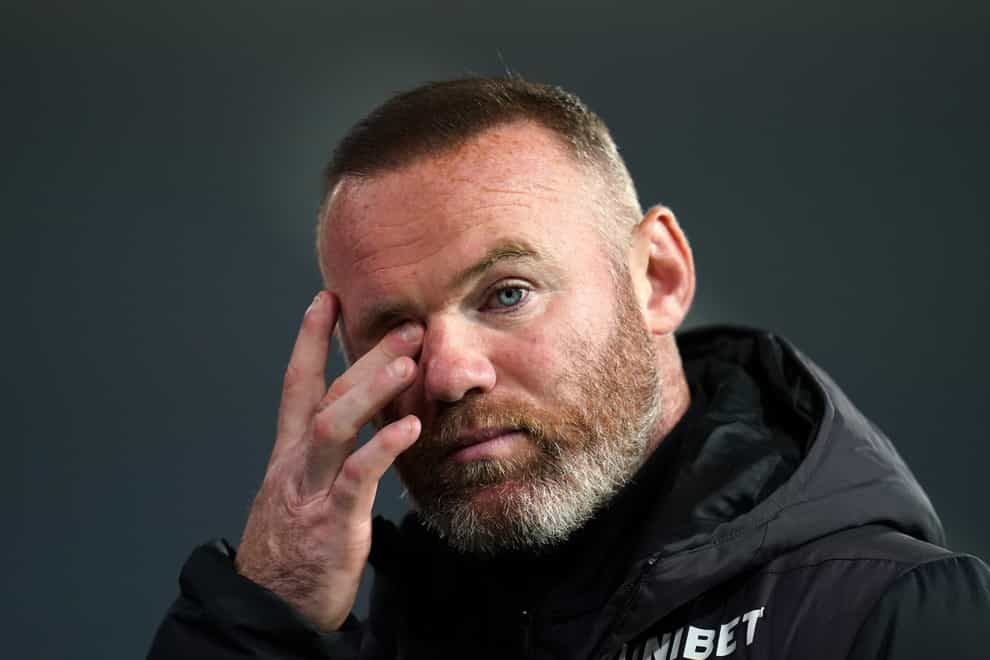 Wayne Rooney found out Derby are set to enter administration on the television (Nick Potts/PA)