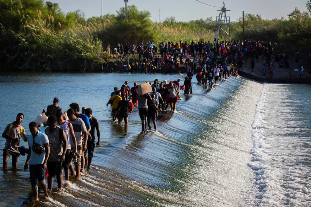 Haiti migrants waiting in Del Rio and Ciudad Acuna to get access to the United States, cross the Rio Grande (Marie D De Jesus/AP)