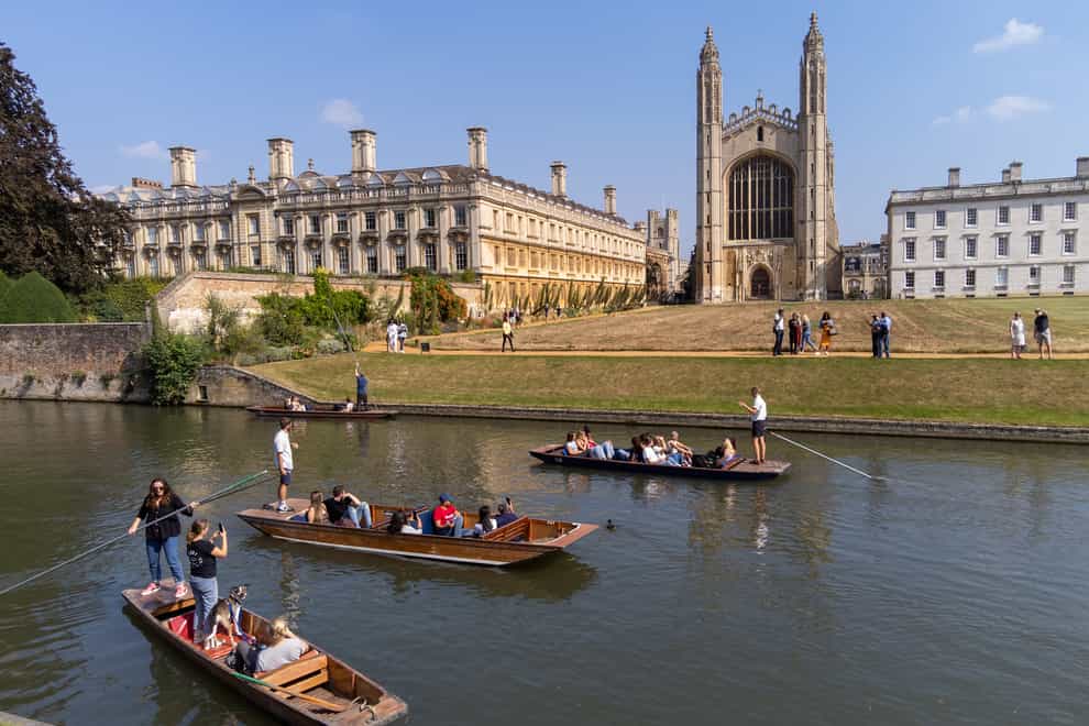 People punt past King’s College along the River Cam in Cambridge. Picture date: Sunday September 5, 2021.