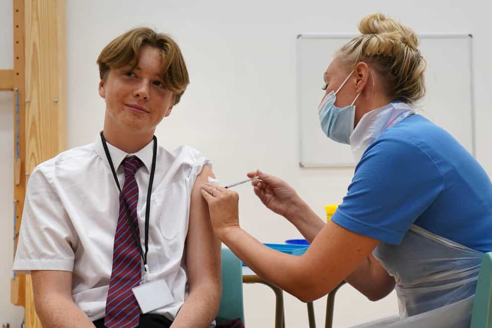 15 year old Quinn Foakes receiving a Covid-19 vaccination at Belfairs Academy in Leigh-on-Sea, Essex. (Gareth Fuller/ PA)