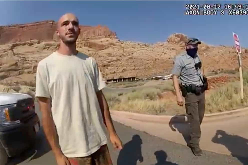 This police camera video provided by The Moab Police Department shows Brian Laundrie talking to a police officer after police pulled over the van he was traveling in with his girlfriend, Gabrielle “Gabby” Petito, near the entrance to Arches National Park on Aug. 12, 2021. The couple was pulled over while they were having an emotional fight. Petito was reported missing by her family a month later and is now the subject of a nationwide search. (The Moab Police Department via AP)