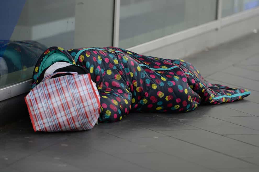 John, who is homeless and has been living on the streets, in Victoria, London (Nick Ansell/PA)
