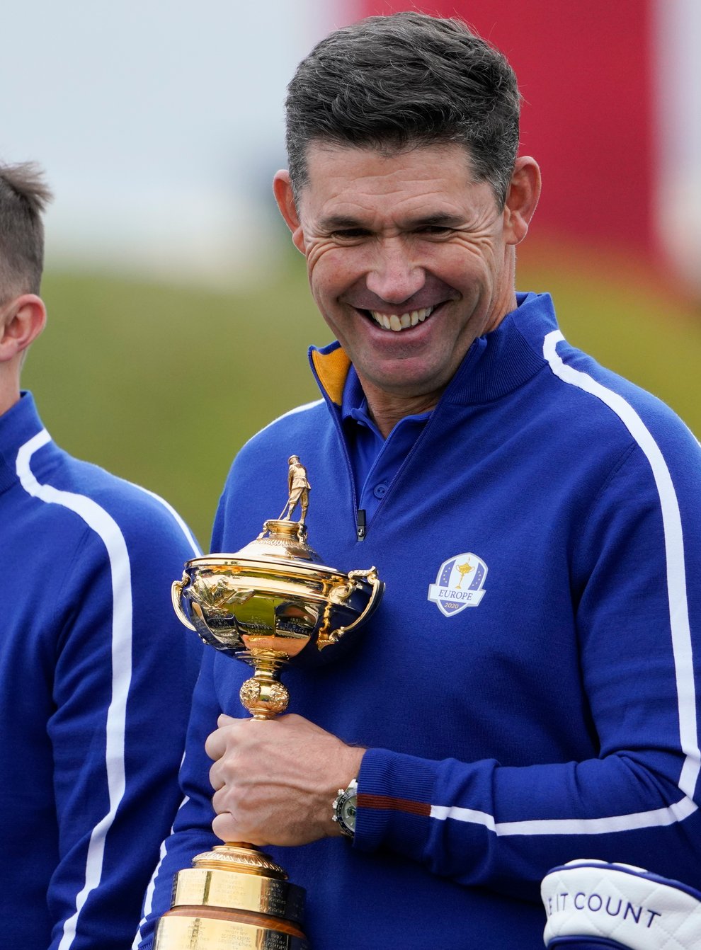 Rory McIlroy (left) and Matt Fitzpatrick (centre) have been reminded of their place in Ryder Cup history by captain Padraig Harrington (Jeff Roberson/AP)