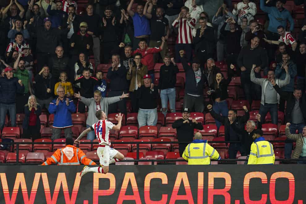 Stoke’s Josh Tymon celebrates the third goal (David Davies/PA)