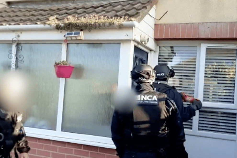 Officers during early morning raids in County Durham on Wednesday. (National Crime Agency/PA)