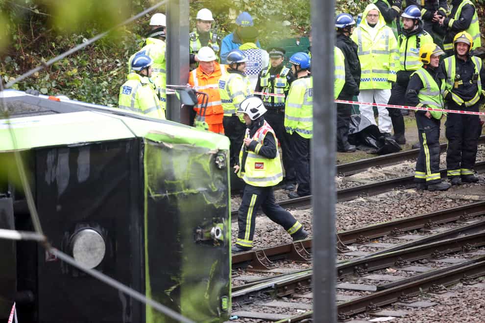 A coroner has urged the Government to consider fitting automatic brakes to trams after seven people were killed in a crash in Croydon, south London in 2016 (Steve Parsons/PA)