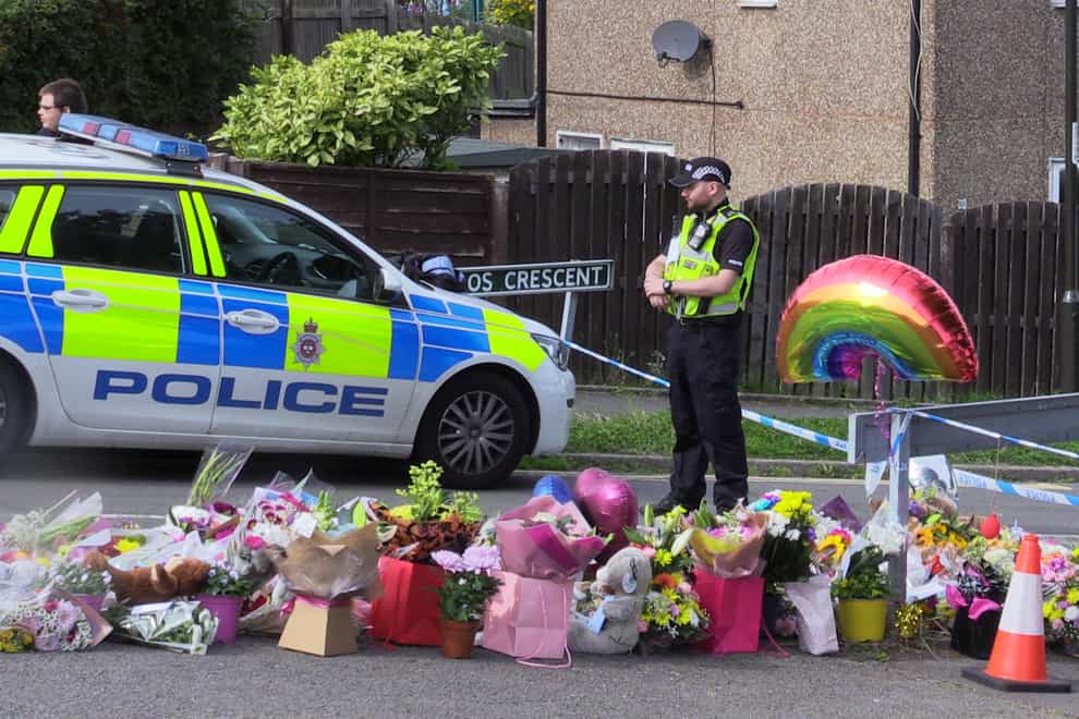Flowers near to the scene in Chandos Crescent, Killamarsh, near Sheffield, where the bodies of John Paul Bennett, 13, Lacey Bennett, 11, their mother Terri Harris, 35, and Lacey�s friend Connie Gent, 11, were discovered at a property on Sunday morning. Picture date: Tuesday September 21, 2021.