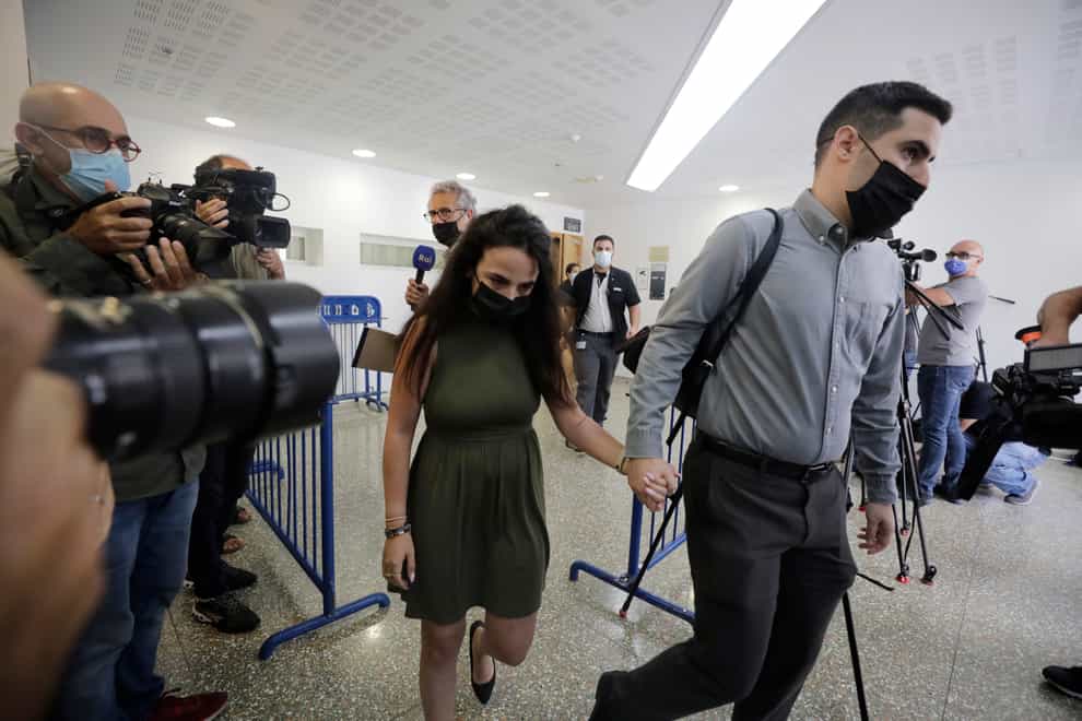 Gali Peleg, a maternal aunt of Eitan Biran, who survived a cable car crash in Italy that killed his immediate family, leaves court in Tel Aviv (AP Photo/Sebastian Scheiner)