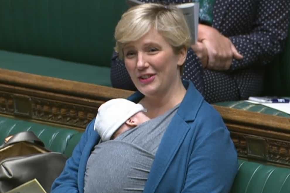 Labour MP Stella Creasy speaking in the chamber of the House of Commons with her son (House of Commons/PA)