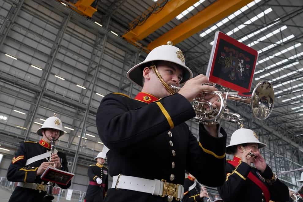 The Royal Marine Band play in The Venturer Building after a frigate steel cutting ceremony for the first of the class Type 31 frigate, at Babcock Rosyth, Fife (Andrew Milligan/PA)