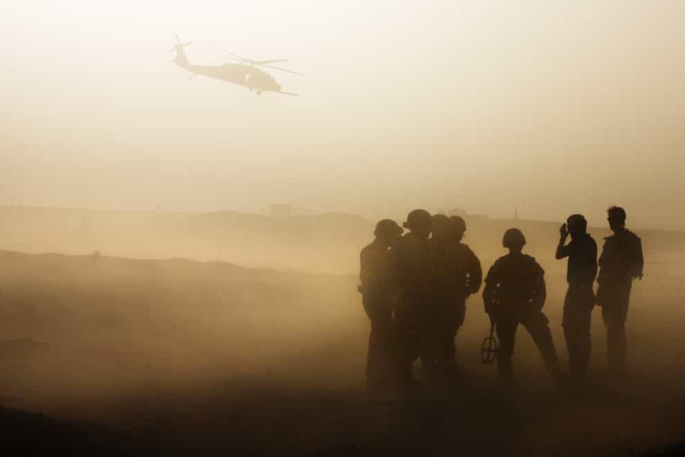 British troops conduct IED training in dusty conditions at Camp Bastion, Helmand Province, Afghanistan (PA)