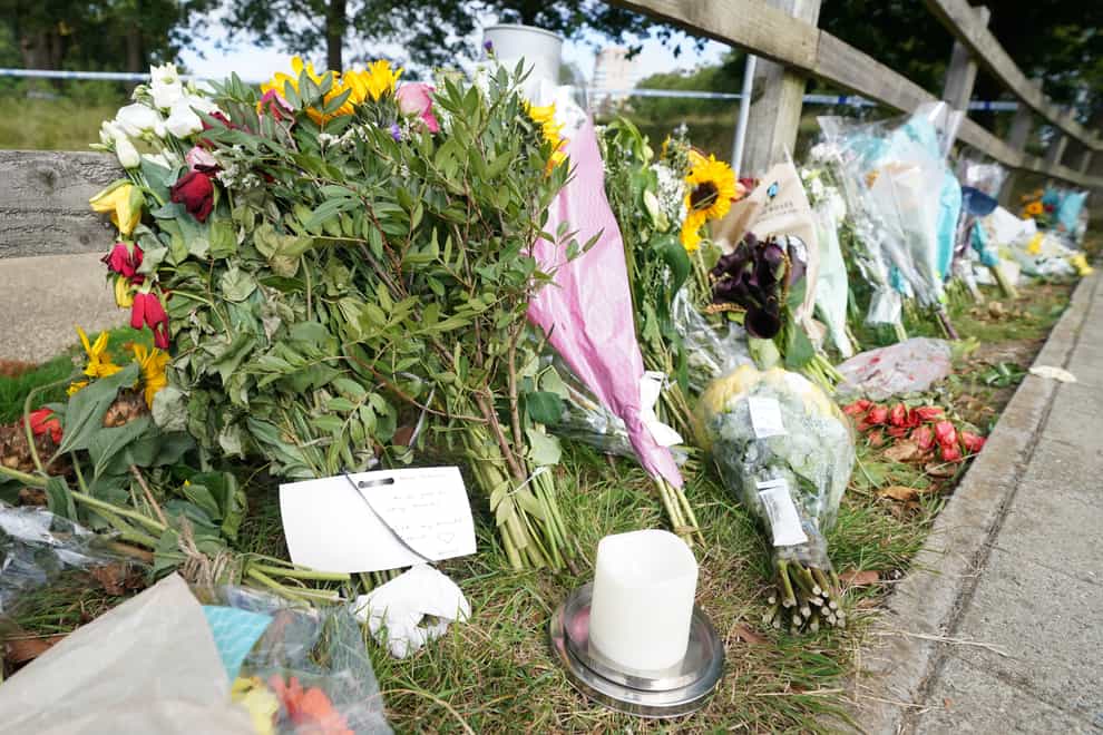 Floral tributes at Cator Park in Kidbrooke, south London (PA)