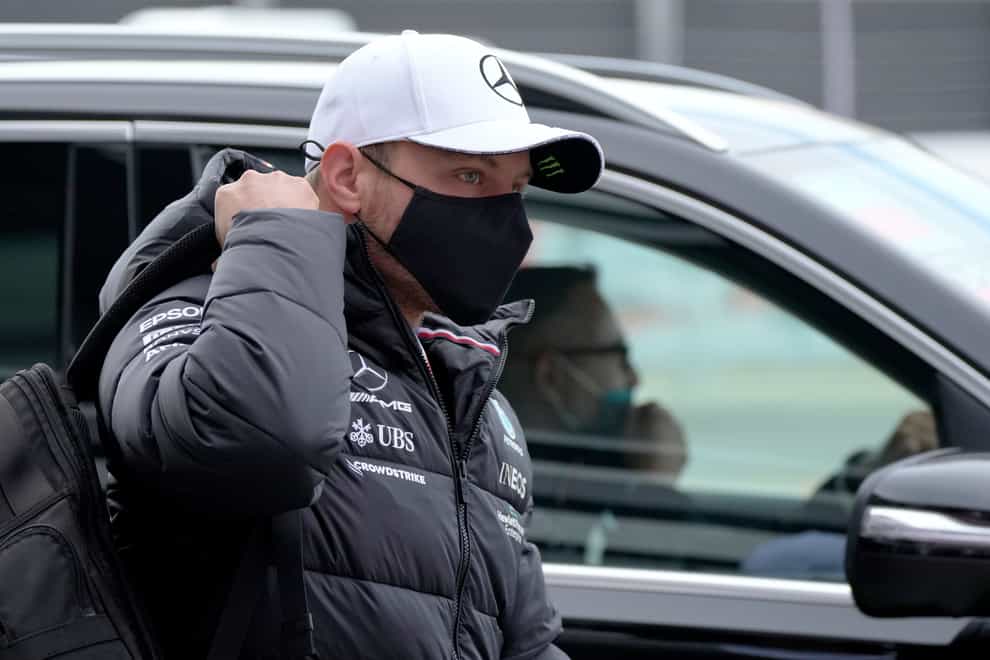 Mercedes driver Valtteri Bottas of Finland arrives for the first practice session at the Sochi Autodrom circuit, in Sochi, Russia, Friday, Sept. 24, 2021. The Russian Formula One Grand Prix will be held on Sunday (AP Photo/Sergei Grits)