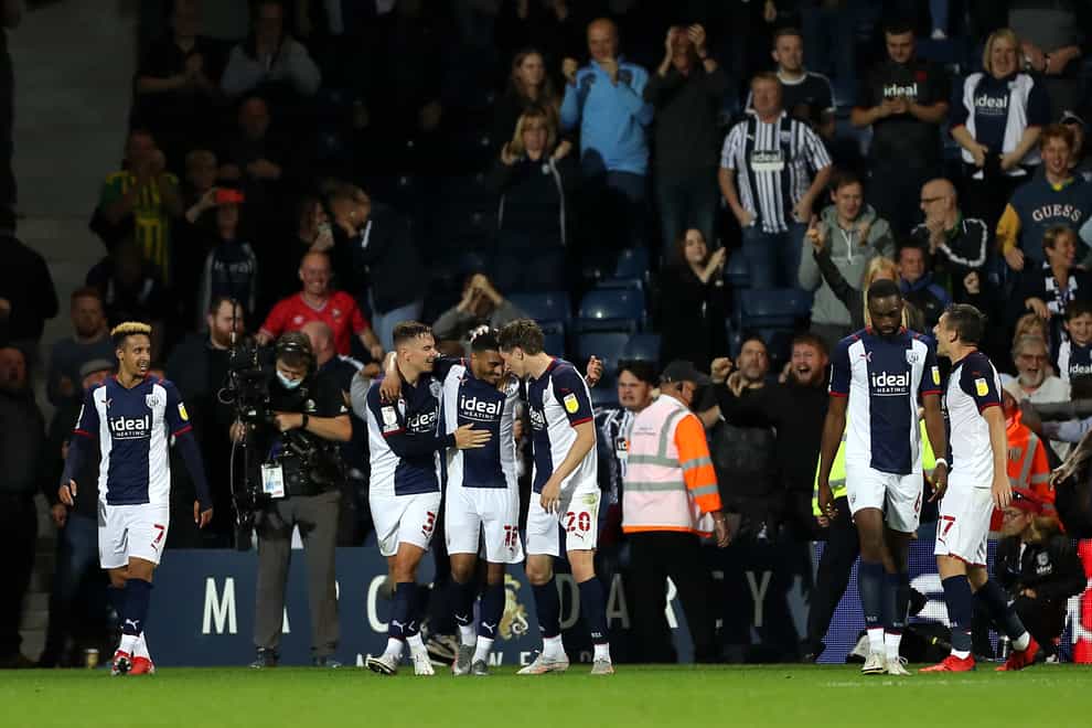Karlan Grant, centre, and West Brom celebrate their late winner (Bradley Collyer/PA)