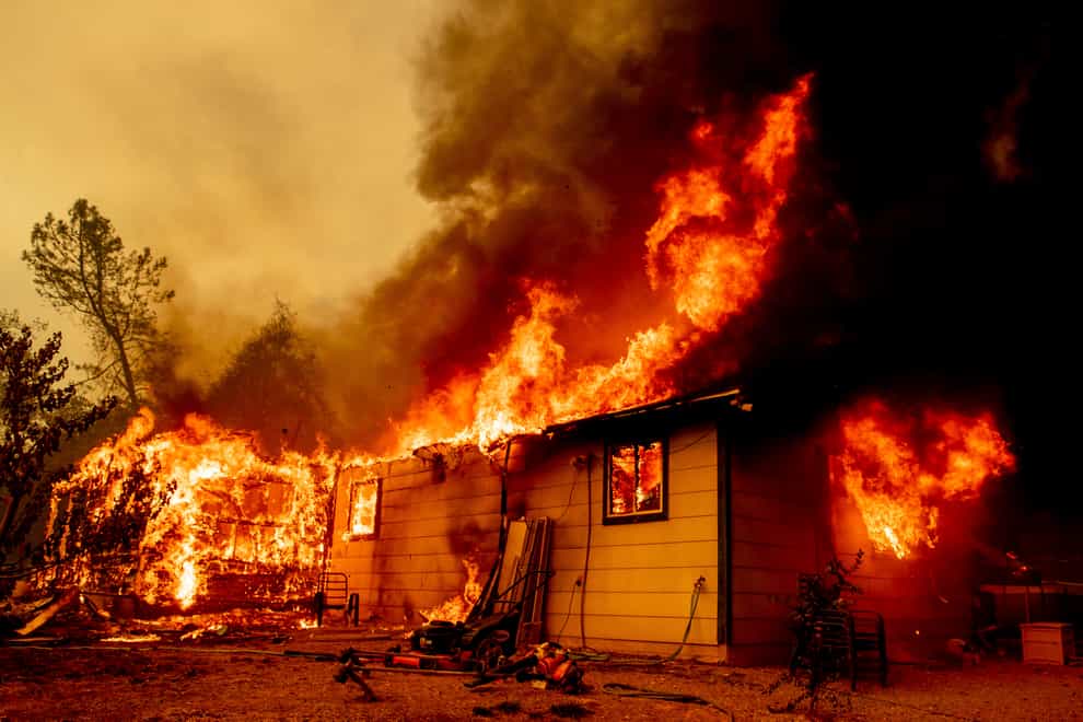 Flames consume a house near Old Oregon Trail in California (AP)