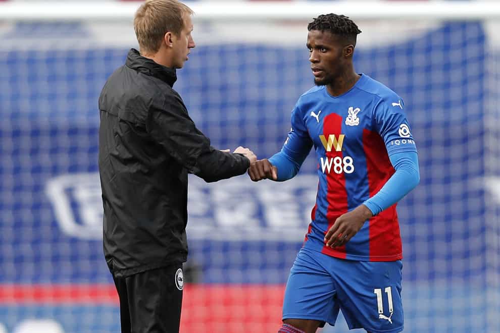 Brighton manager Graham Potter (left) is well aware of the threat posed by Crystal Palace’s Wilfried Zaha (Adrian Dennis/PA)