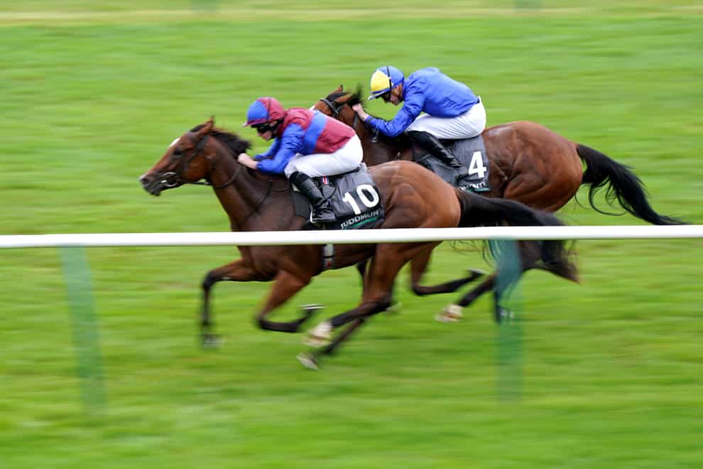 Tenebrism ridden by Ryan Moore (left) on their way to winning the Juddmonte Cheveley Park Stakes during Juddmonte Day of the Cambridgeshire Meeting at Newmarket Racecourse. Picture date: Saturday September 25, 2021.
