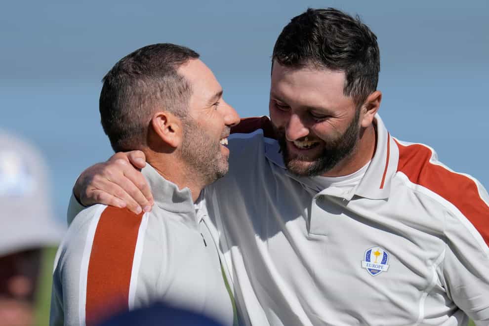 Sergio Garcia and Jon Rahm celebrate after winning their foursomes match on day two of the 43rd Ryder Cup (Ashley Landis/AP)