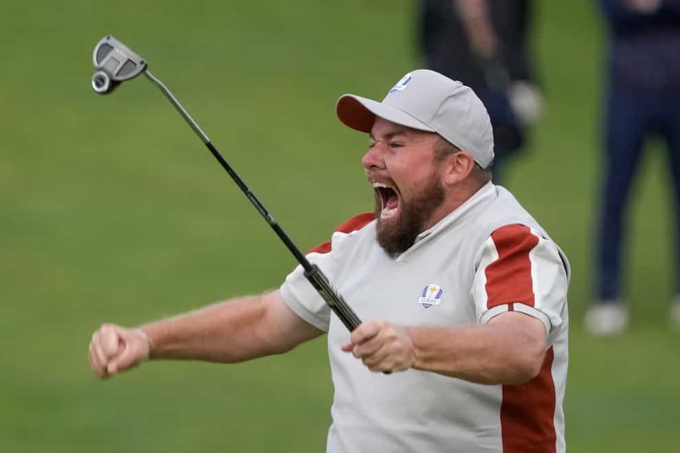 Team Europe’s Shane Lowry celebrates on the 18th hole after winning his match with Tyrrell Hatton (Charlie Neibergall/AP)