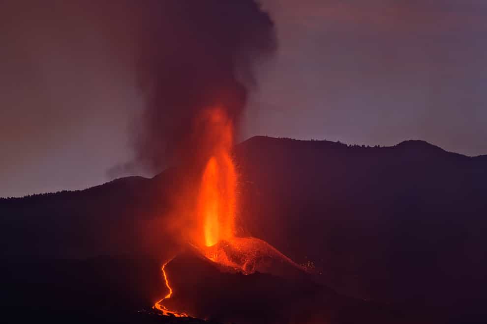 Lava flows from a volcano on the Canary island of La Palma, Spain, in the early hours of Sunday (Daniel Roca/AP)