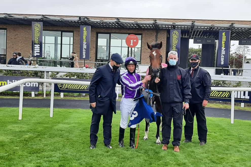 Concert Hall with trainer Aidan O’Brien (far left) and jockey Seamie Heffernan after her victory in the Weld Park Stakes at the Curragh (Alan Magee/PA)