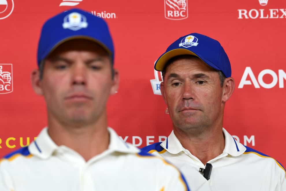 Team Europe captain Padraig Harrington, at right alongside Paul Casey, during a press conference after their heavy defeat to Team USA (Anthony Behar/PA)