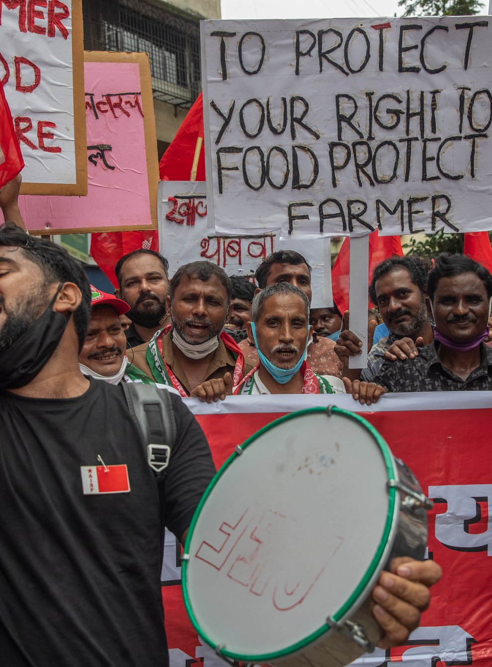 Communist Party of India members protest against farm laws in Mumbai (Rafiq Maqbool/AP)