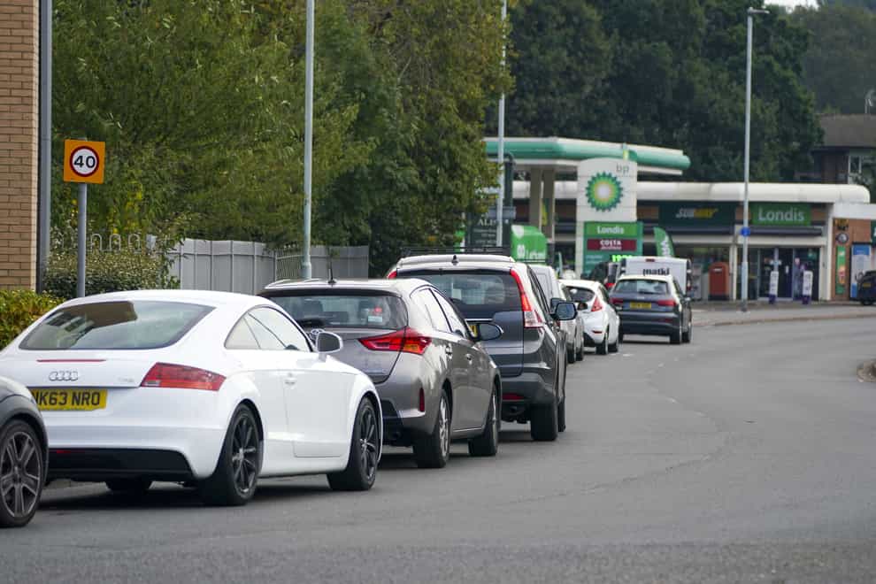 Cars queue for fuel at a BP petrol station in Bracknell, Berkshire (PA)