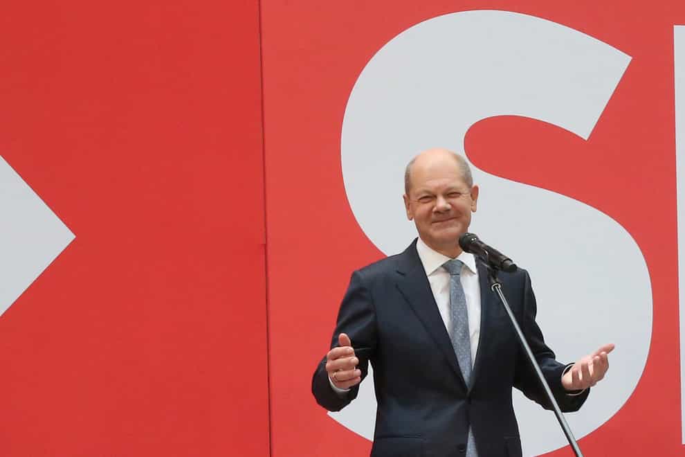 Social Democratic candidate for chancellor Olaf Scholz speaks at party headquarters in Berlin (Wolfgang Kumm/dpa via AP)