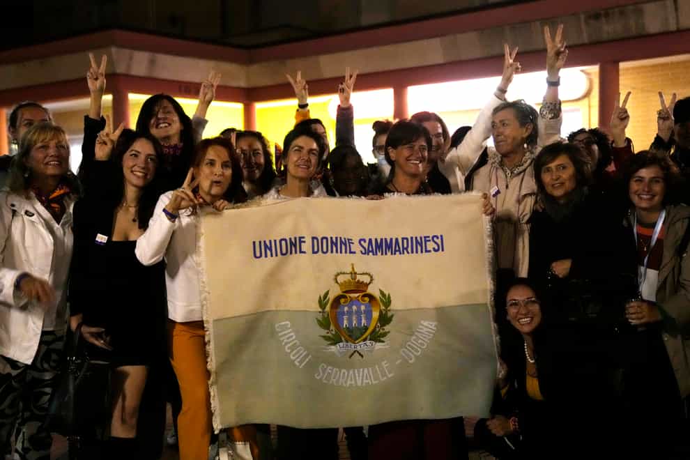 Activists in San Marino celebrate the referendum result (Antonio Calanni/AP)