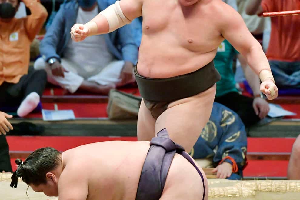 Hakuho’s retirement marks the end of an era in the history of sumo (Kyodo News via AP)