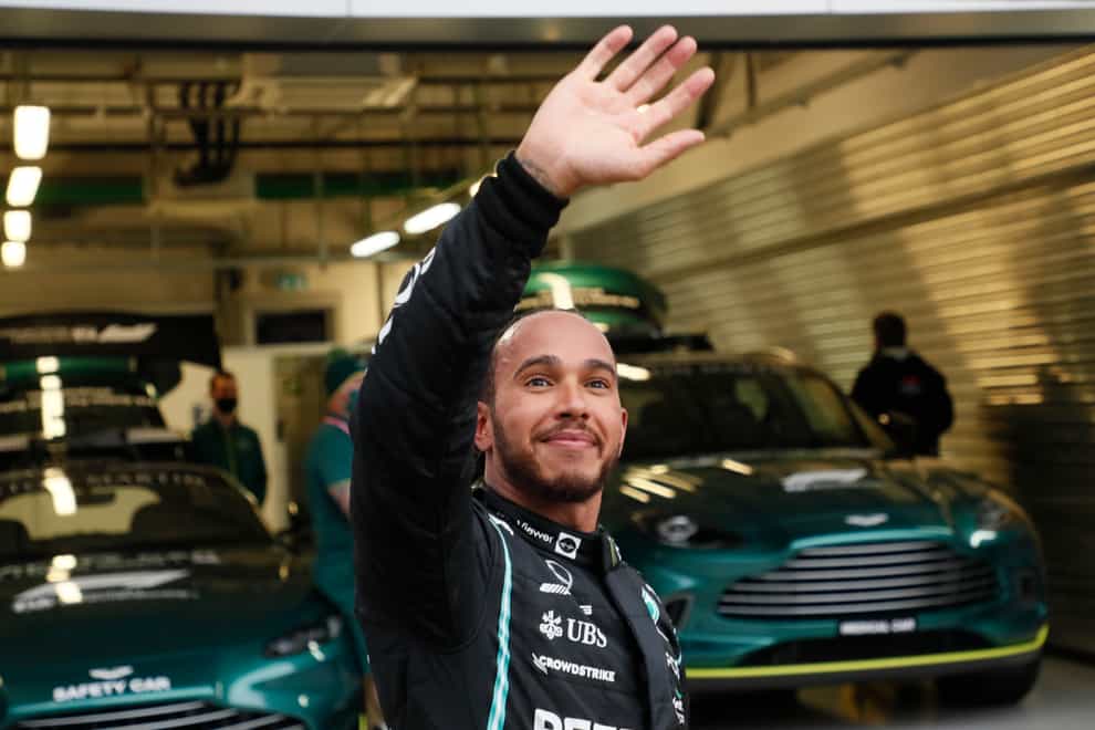 Lewis Hamilton celebrates his 100th career win (Yuri Kochetkov/AP)
