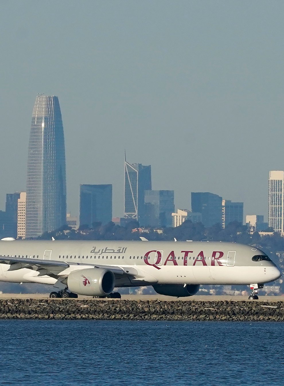 The airline is based in the energy-rich Gulf Arab state of Qatar (Jeff Chiu/AP)
