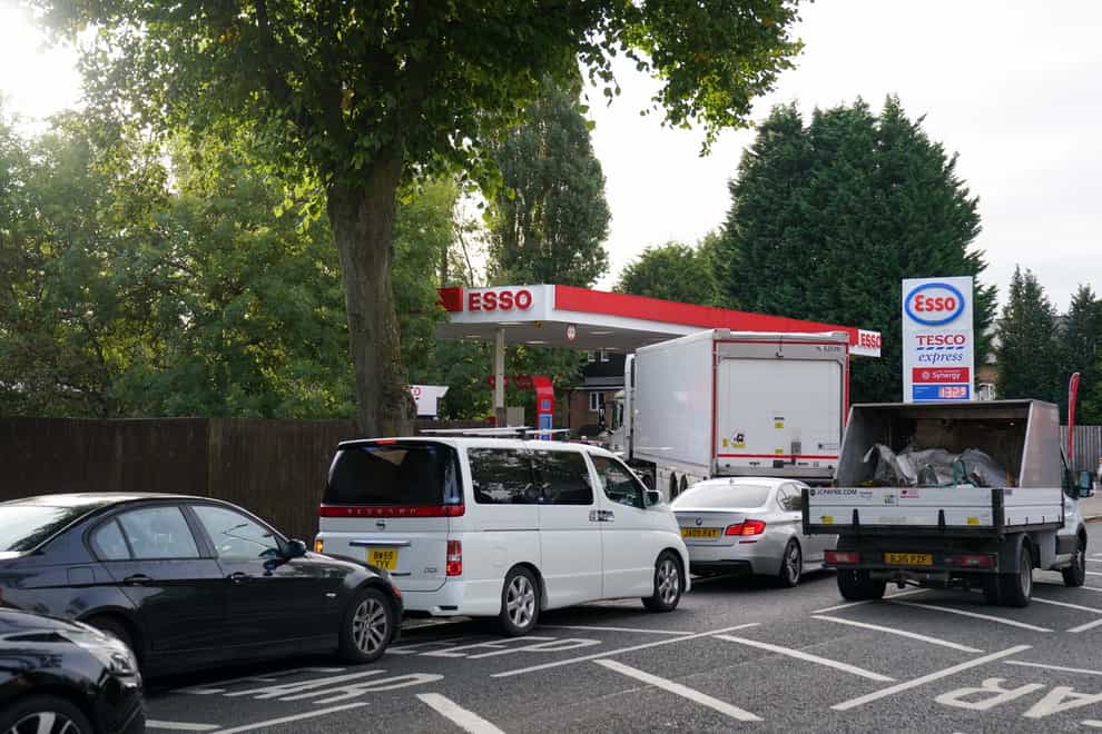 Drivers queue for fuel at an Esso petrol station in Bournville, Birmingham (Jacob King/PA)