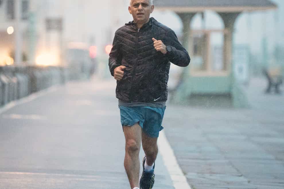 Mayor of London Sadiq Khan runs along the seafront in Brighton where the Labour Party is holding its conference (Stefan Rousseau/PA)