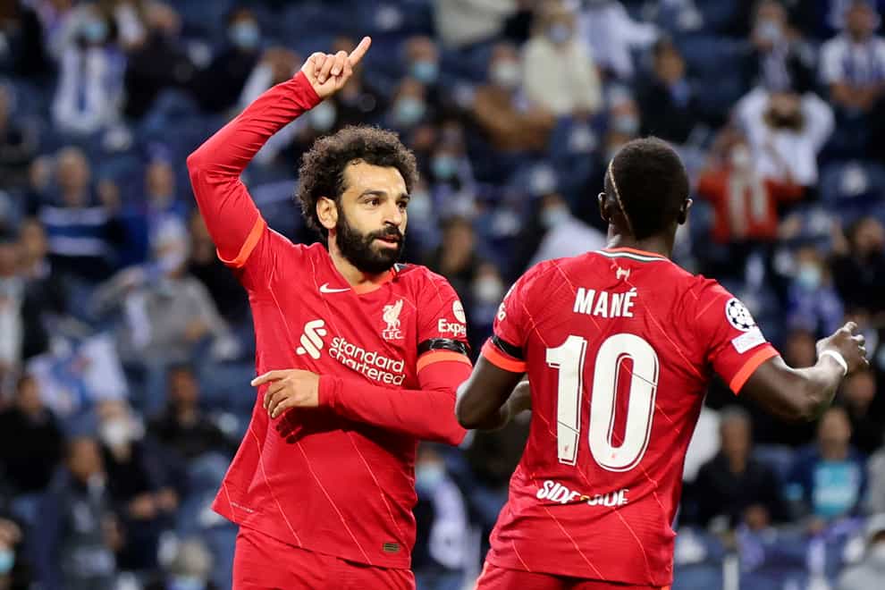 Mohamed Salah (left) scored twice for Liverpool (Luis Vieira/AP)