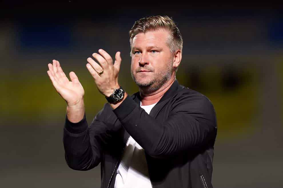 Karl Robinson saw his team bounce back to winning ways in style (Jacob King/PA)