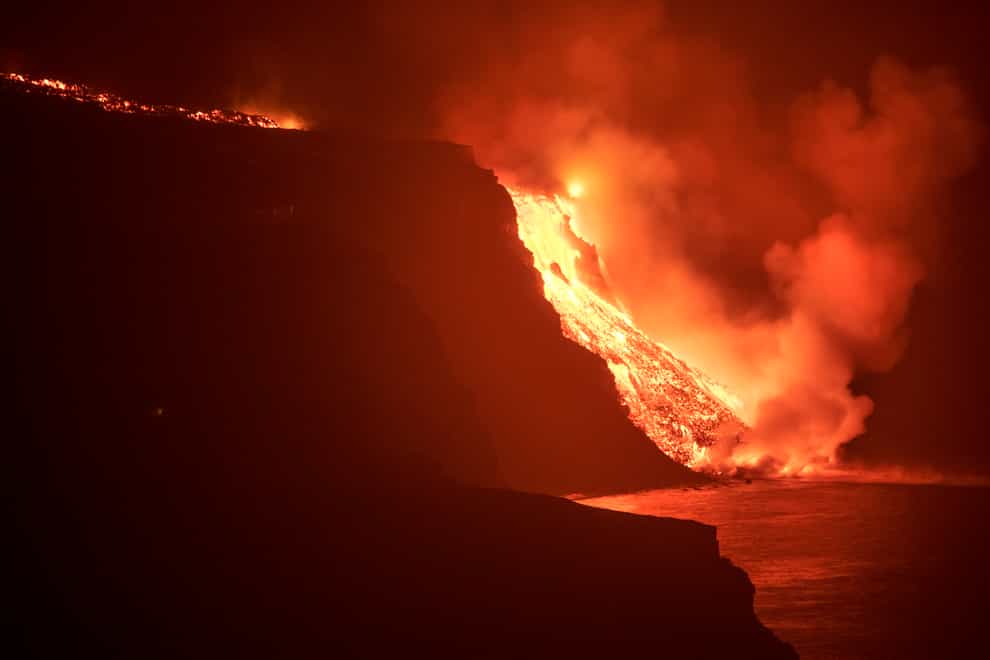 Lava from a volcano reaches the sea at Los Guirres beach, also known as Playa Nueva, on La Palma (AP Photo/Saul Santos)