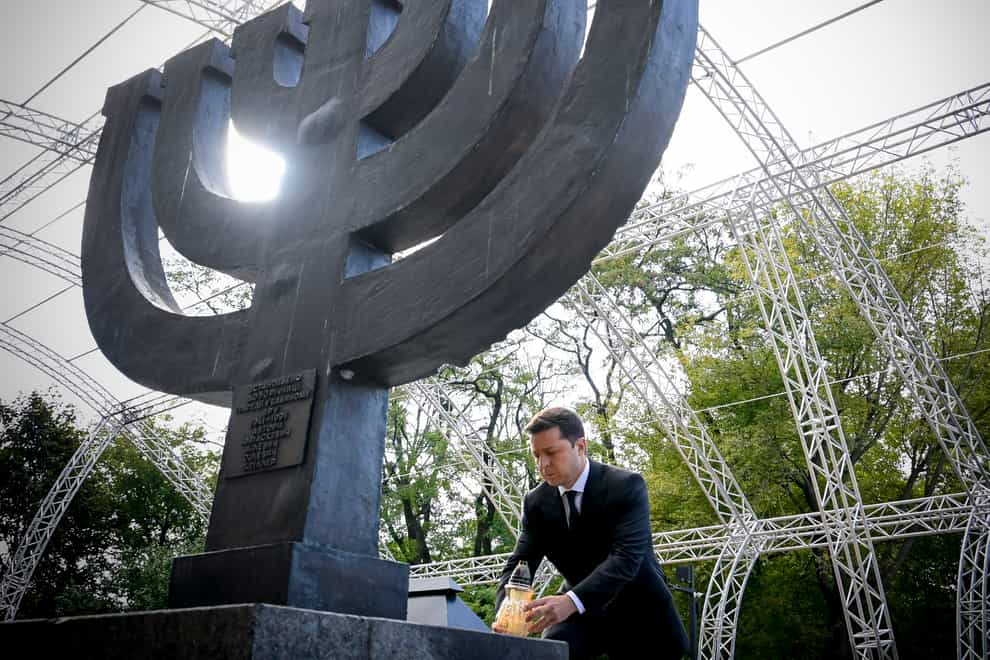 Ukrainian President Volodymyr Zelenskyy attends a ceremony at the monument to Jewish victims of Nazi massacres in Ukraine’s capital Kyiv (AP)